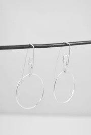 CIRCLE ON CAST BAR EARRINGS